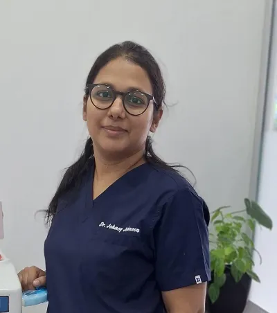 Dr. Joncy John